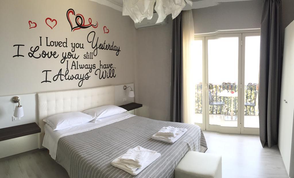 Athena Charming Rooms Таормина Экстерьер фото
